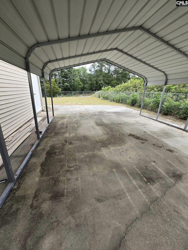 view of car parking featuring a carport