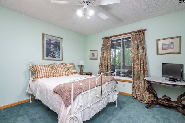 bedroom featuring carpet, ceiling fan, and a textured ceiling