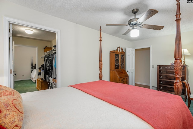 bedroom with a textured ceiling, a closet, and ceiling fan