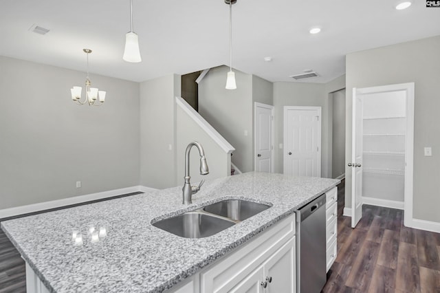 kitchen with dark hardwood / wood-style flooring, stainless steel dishwasher, sink, white cabinets, and an island with sink