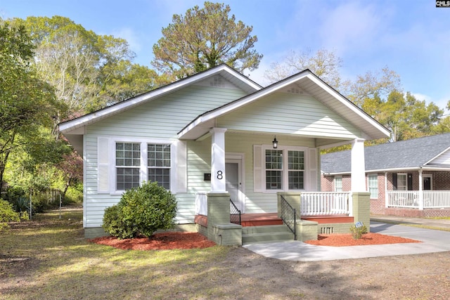 bungalow-style house featuring covered porch