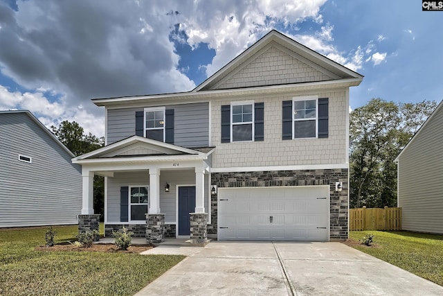 craftsman inspired home featuring a garage, a porch, and a front yard