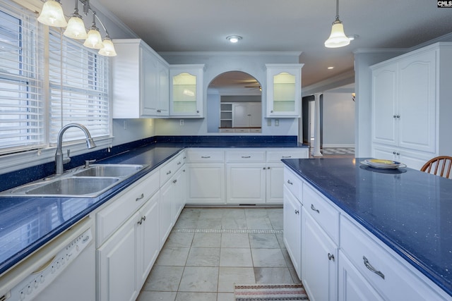 kitchen with dishwasher, white cabinets, and decorative light fixtures