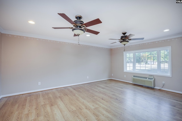 spare room featuring a wall mounted air conditioner, ceiling fan, crown molding, and light hardwood / wood-style flooring