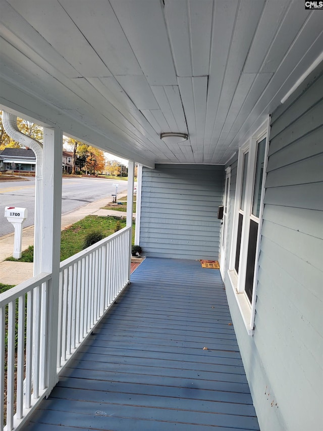 wooden deck featuring a porch