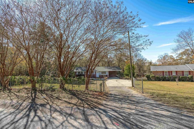 view of front of home with a front lawn