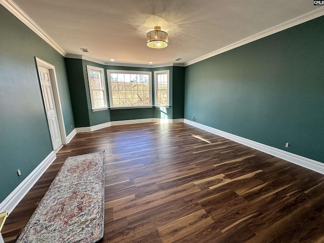 unfurnished room featuring crown molding and dark wood-type flooring