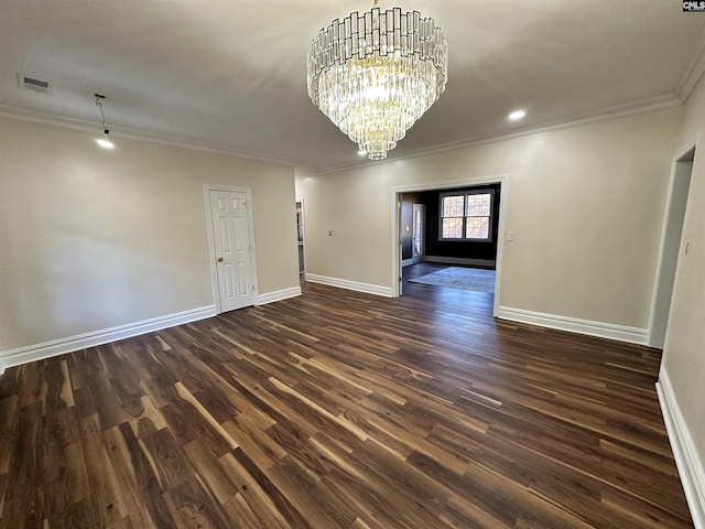 interior space with a chandelier, crown molding, and dark wood-type flooring