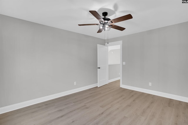 unfurnished room featuring ceiling fan and light wood-type flooring