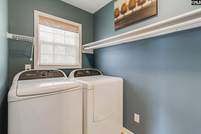 washroom with laundry area and washer and clothes dryer