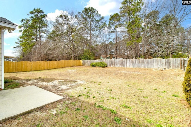 view of yard featuring a fenced backyard