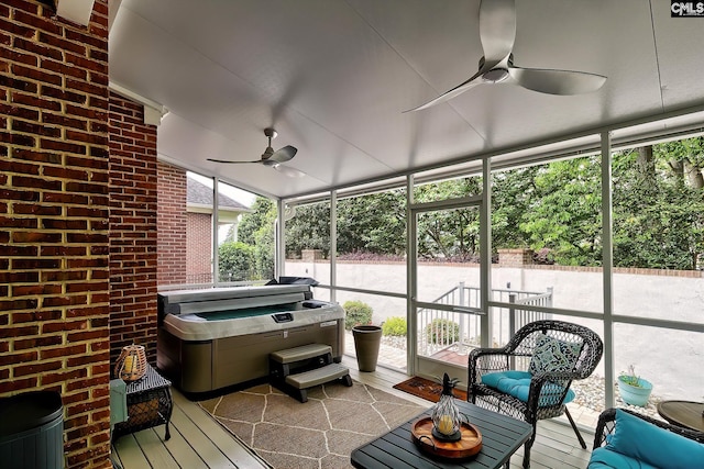 sunroom / solarium with ceiling fan