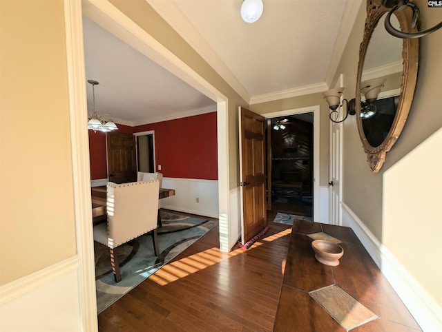 interior space featuring ornamental molding and hardwood / wood-style flooring