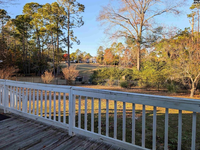 wooden deck with a yard