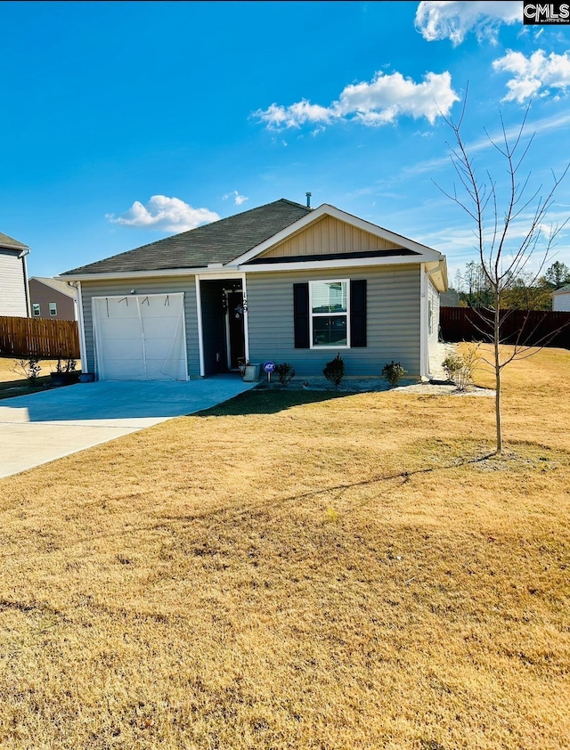 single story home with a front lawn and a garage