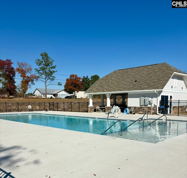 view of pool with a patio area