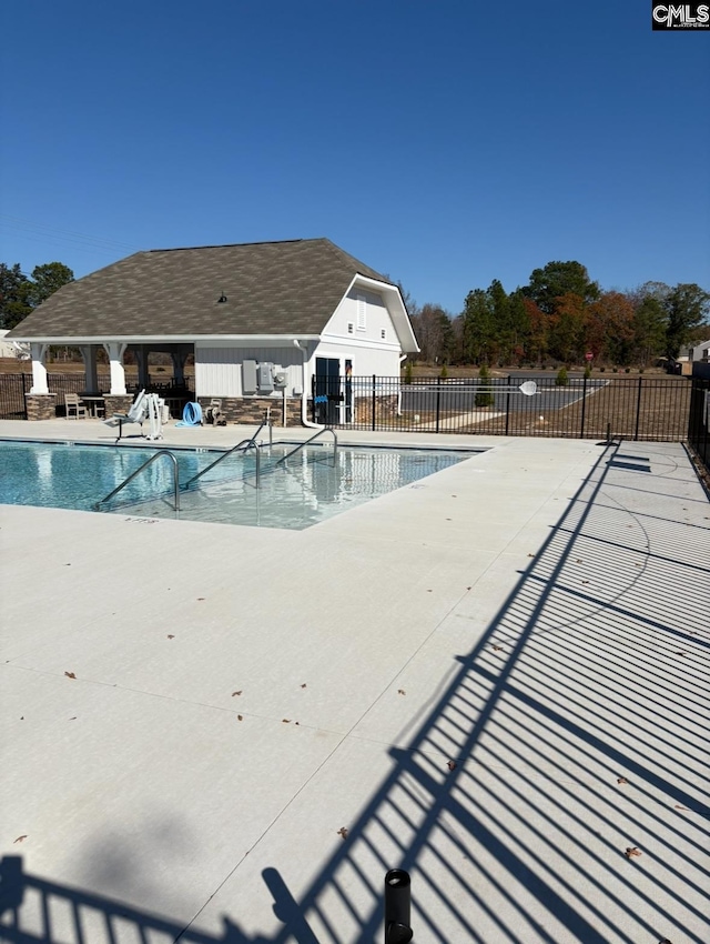 view of pool featuring a patio area