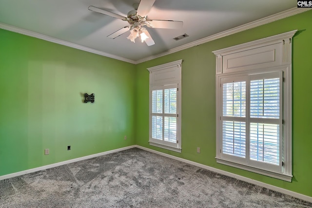 unfurnished room with carpet flooring, ceiling fan, and ornamental molding