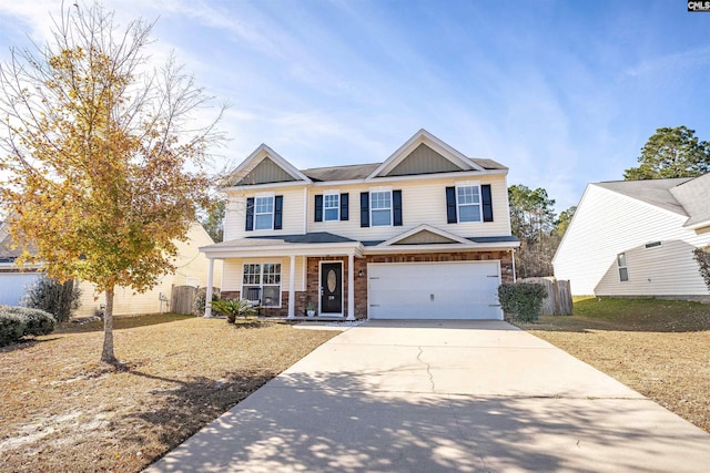 view of front of property with a front lawn and a garage