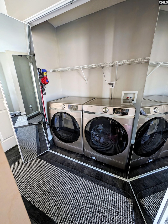 washroom featuring independent washer and dryer