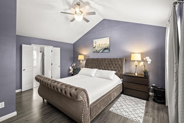 bedroom featuring ceiling fan, lofted ceiling, and dark wood-type flooring