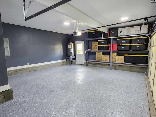 garage with a garage door opener and water heater