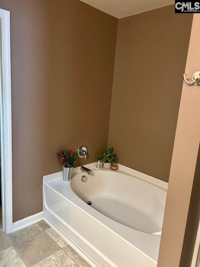 bathroom with a washtub