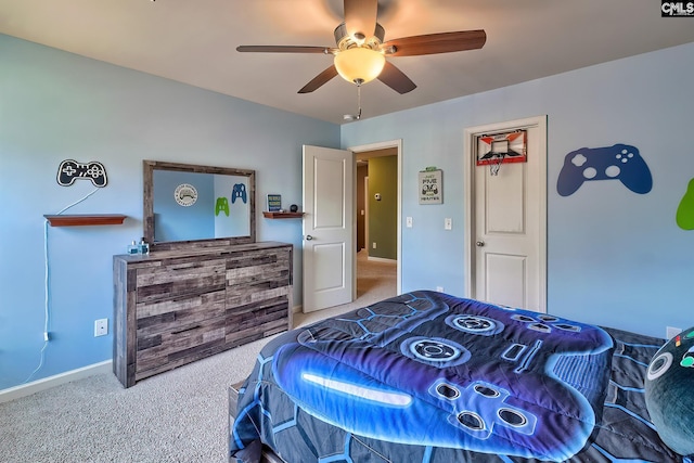 bedroom featuring ceiling fan and carpet floors