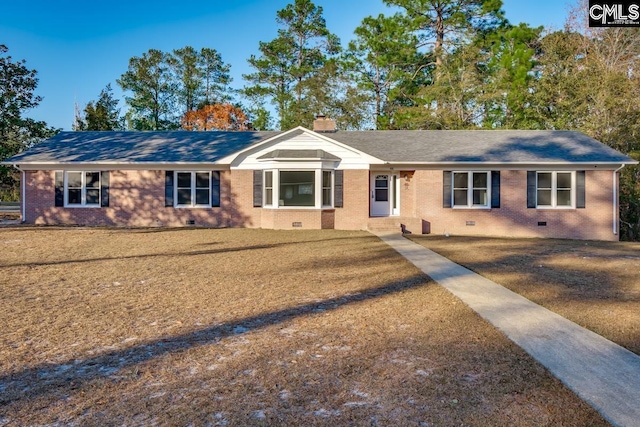 single story home featuring a front yard