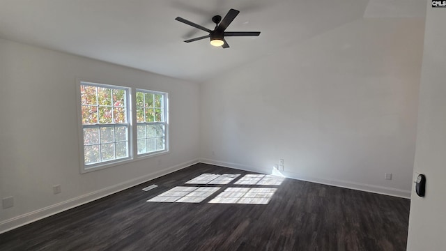 unfurnished room with ceiling fan, dark wood-type flooring, and lofted ceiling