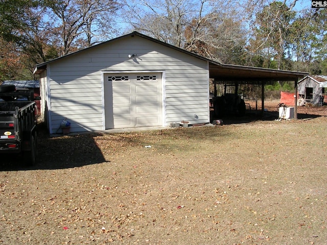 garage featuring a carport