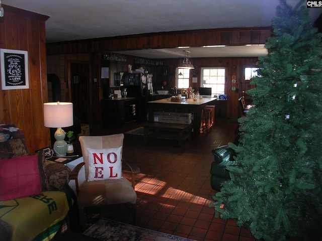 living room with wood walls