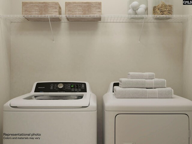 laundry area with washer and clothes dryer