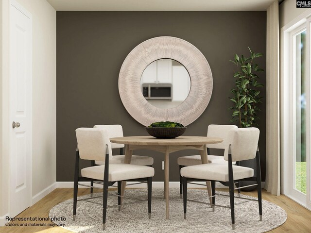 dining area featuring light hardwood / wood-style floors