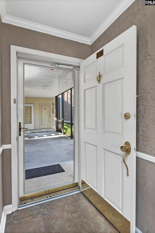 entrance foyer with ornamental molding