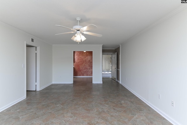 unfurnished room with ceiling fan and ornamental molding