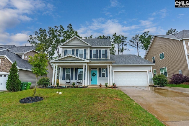 view of front of house featuring covered porch, a garage, and a front yard