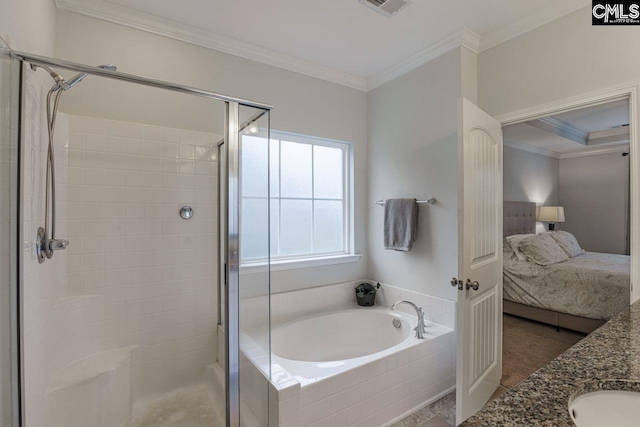 bathroom with vanity, independent shower and bath, and crown molding