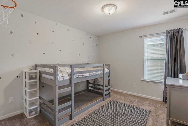 bedroom featuring carpet