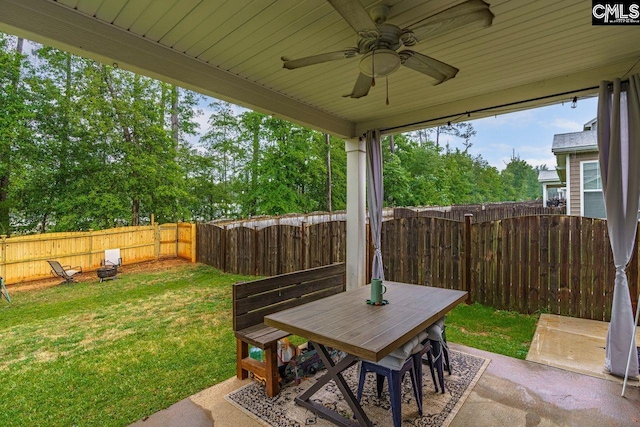 view of patio / terrace featuring ceiling fan