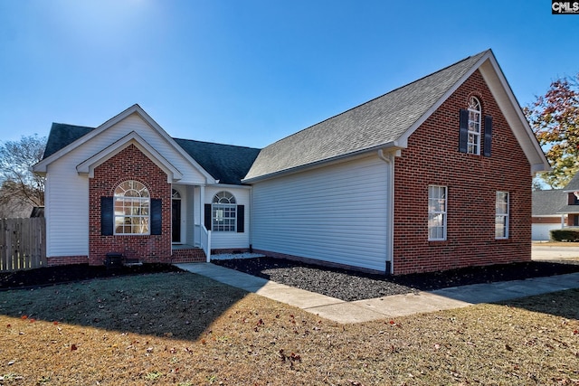 view of front of home with a front yard