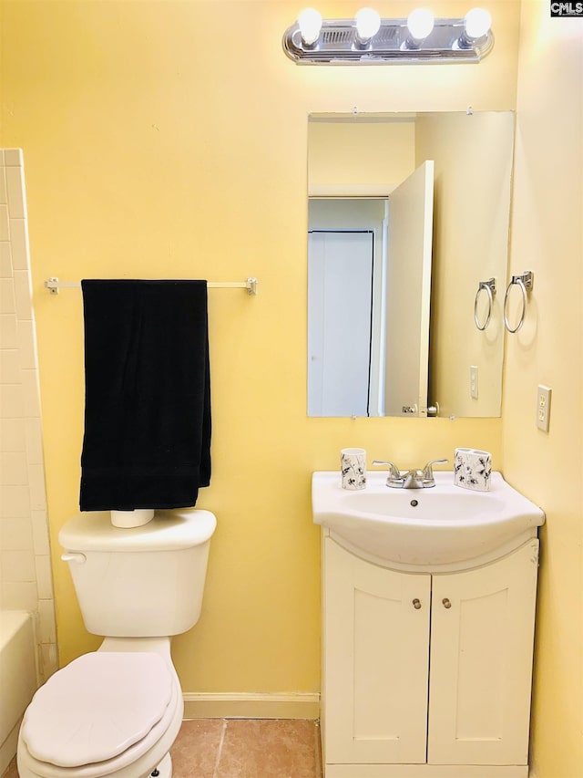 full bathroom with tile patterned floors, vanity, shower with separate bathtub, and toilet