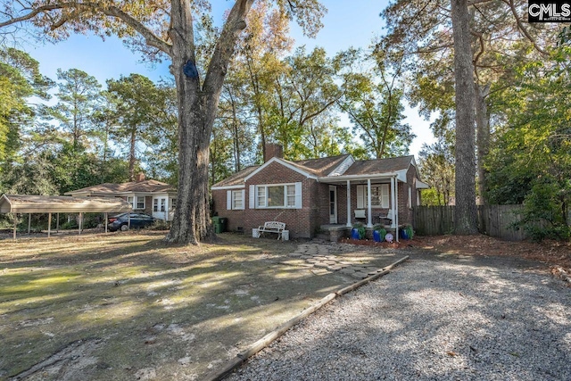 single story home featuring a porch