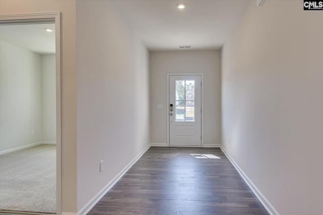 doorway to outside featuring dark hardwood / wood-style flooring