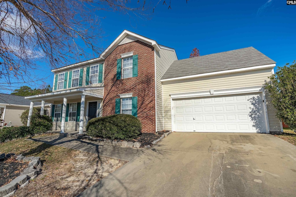 colonial home featuring a garage