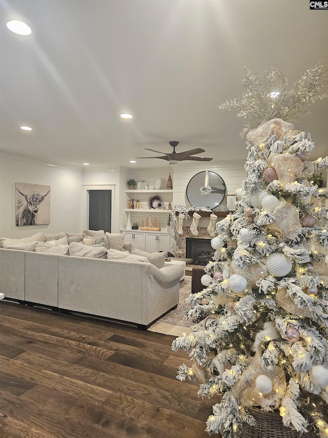 235 Clayborn Dr, Lexington, SC 29072 - living room featuring ceiling fan, a large fireplace, crown molding, and dark hardwood / wood-style floors
