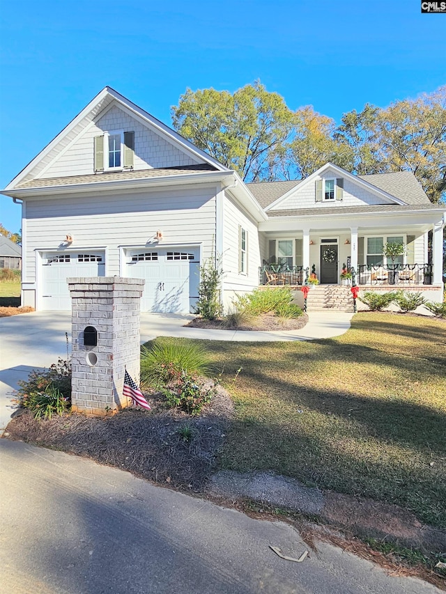 235 Clayborn Dr, Lexington, SC 29072 - view of front of home with a front lawn, a porch, and a garage