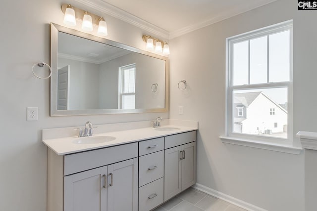 bathroom with tile patterned flooring, vanity, and crown molding