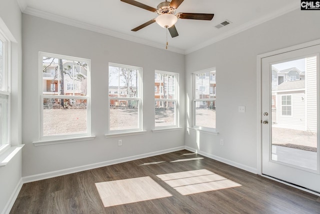 unfurnished sunroom with ceiling fan and visible vents