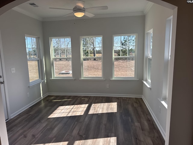 interior space featuring arched walkways, visible vents, and ceiling fan